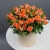 Композиция в шляпной коробке из оранжевых кустовых роз в Мытищах Композиция в шляпной коробке из оранжевых кустовых роз в Мытищах