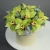 Композиция в шляпной коробке из 11 лаймовых орхидей в Мытищах Композиция в шляпной коробке из 11 лаймовых орхидей в Мытищах